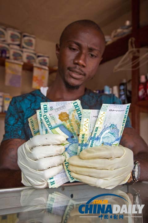 埃博拉病毒重創西非經濟 圖說疫區市集買賣