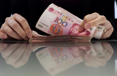 港媒:人民幣走強有助經濟轉型 押寶貶值不明智