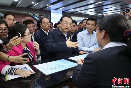 境外媒體:中國設立自貿區意在倒逼金融改革