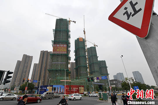 資料圖:福州一處商品房在建中。 <a target='_blank' href='http://www.chinanews.com/' _fcksavedurl='http://www.chinanews.com/'></table><p align=